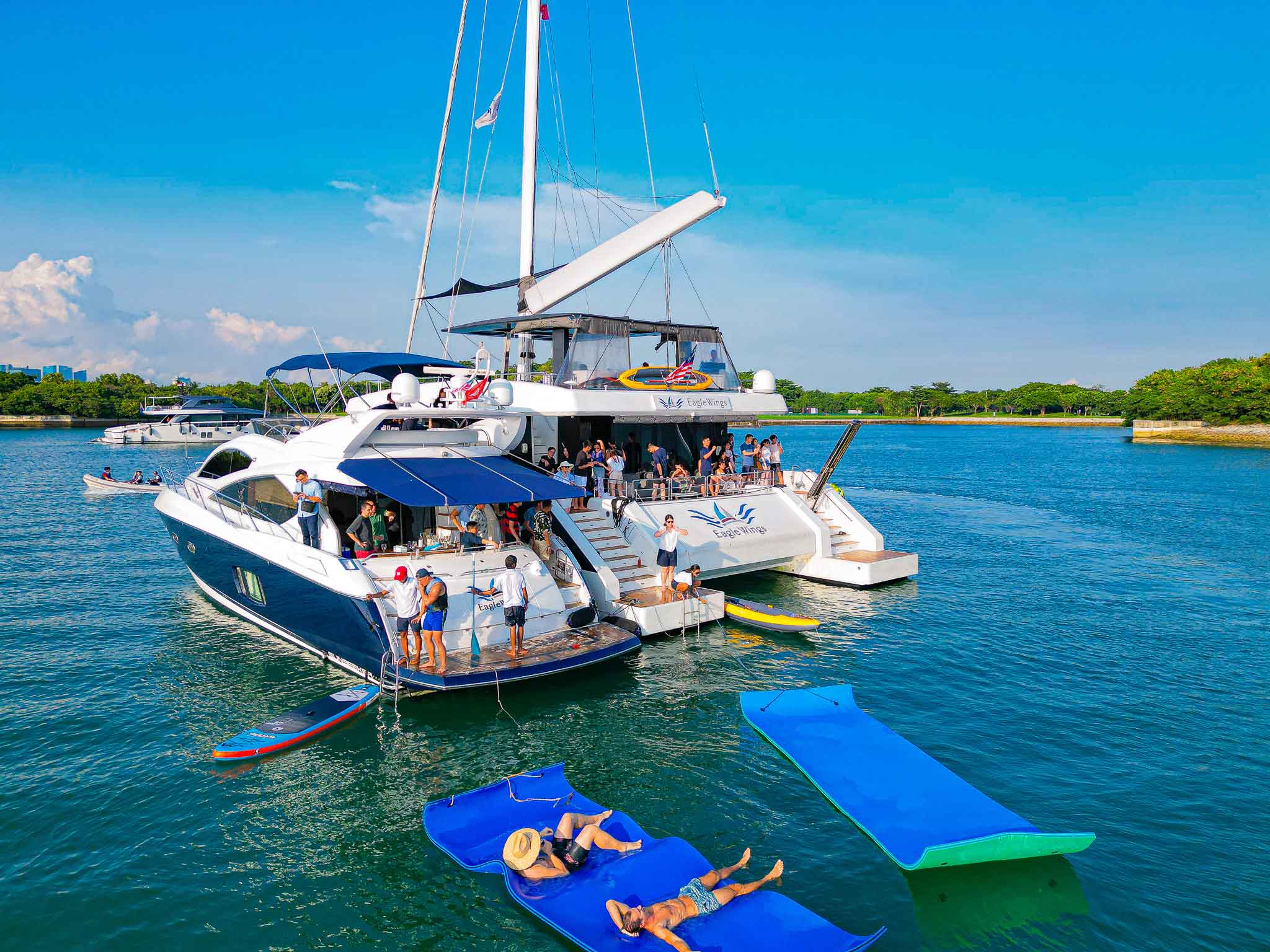 water activities with giant slide, giant float and water toys on yacht charters in Singapore